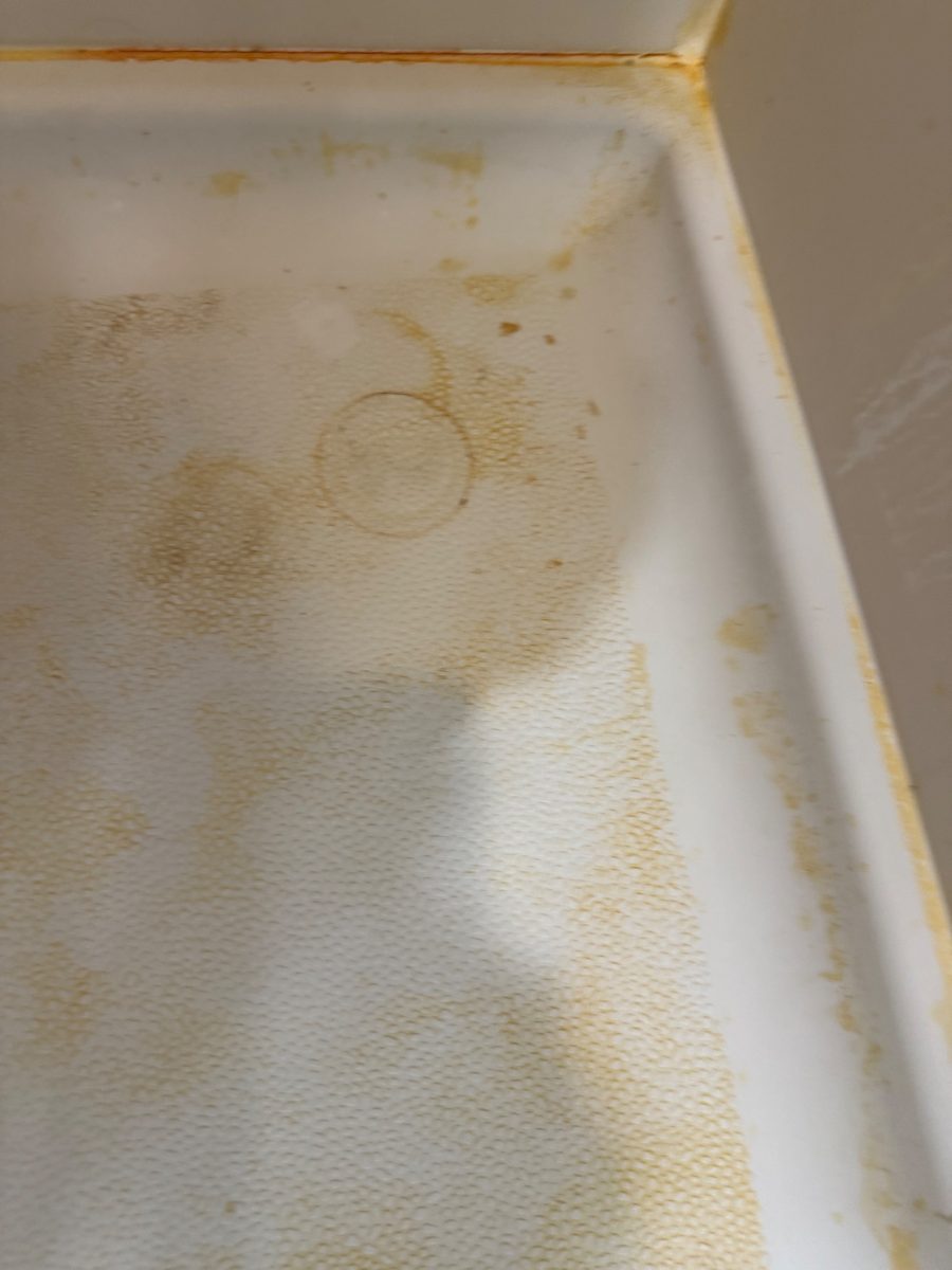 Shower floor before cleaning